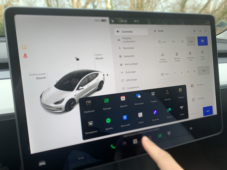 tesla what did the recent update to these high tech cars really bring