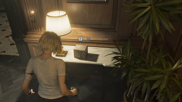 Salle de jeux Resident Evil Requiem : comment ouvrir la porte avec le renfoncement ? 